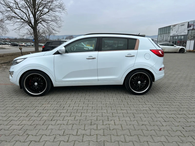 Kia Sportage 2.0 CRDI 4x4, снимка 4 - Автомобили и джипове - 49086118