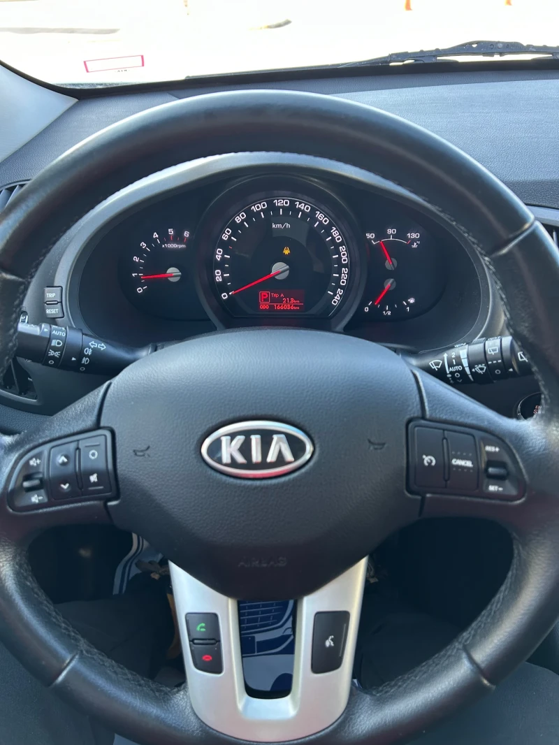 Kia Sportage 2.0 CRDI 4x4, снимка 10 - Автомобили и джипове - 49086118