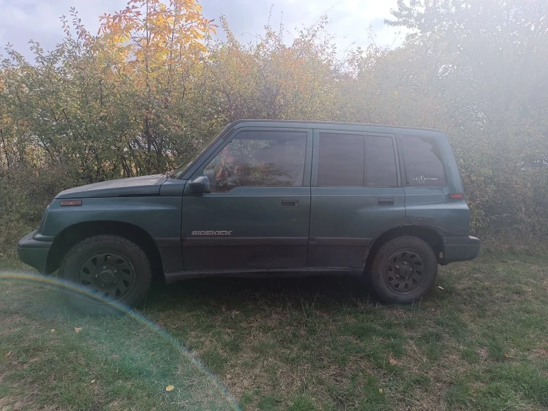 Suzuki Sidekick, снимка 1 - Автомобили и джипове - 48416979