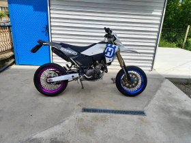 ������ Husqvarna SM
