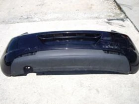 Оригинална задна броня със спойлера за Опел Астра 2009-2012г...13266587...13266594..., снимка 1