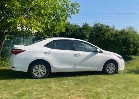 Toyota Corolla 1.6VVt-i - 9500 € / 18580.38 лв. - 33130980 5