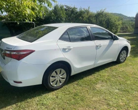 Toyota Corolla 1.6VVt-i - 9500 € / 18580.38 лв. - 33130980 3