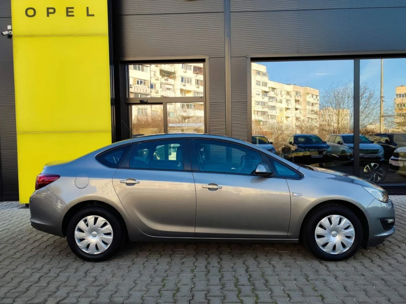 Opel Astra Enjoy 1.6 (116hp) MT5, снимка 4 - Автомобили и джипове - 52772677