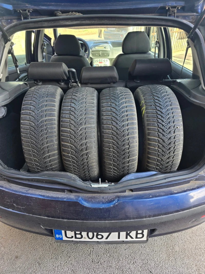 Fiat Punto 1.2 i климатик, снимка 9 - Автомобили и джипове - 53201568