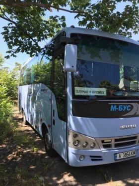 Isuzu Q-BUS 31 туристически, снимка 11