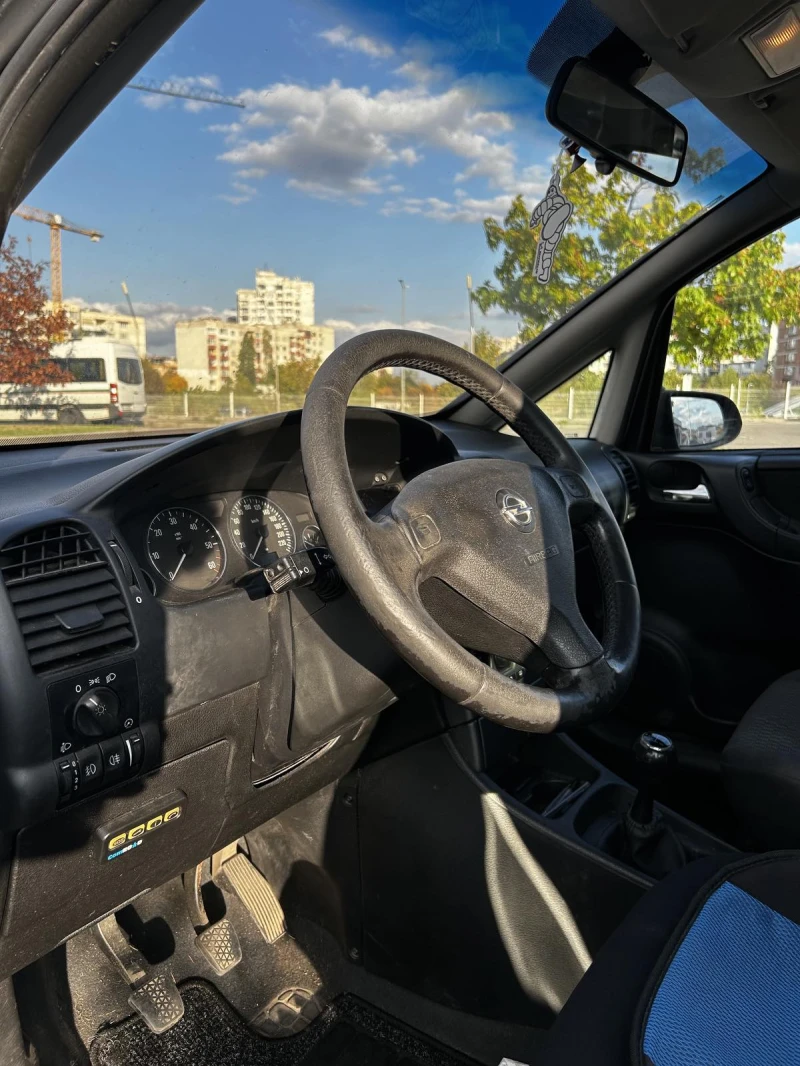 Opel Zafira, снимка 12 - Автомобили и джипове - 47564520