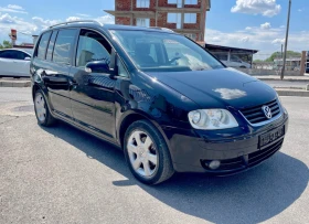 VW Touran 2.0 TDI 7 | Mobile.bg    2