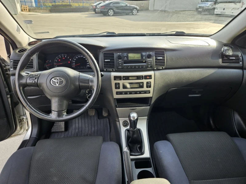 Toyota Corolla 1.4VVti седан, снимка 12 - Автомобили и джипове - 52293450
