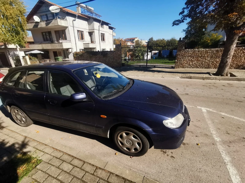 Mazda 323, снимка 2 - Автомобили и джипове - 47757793