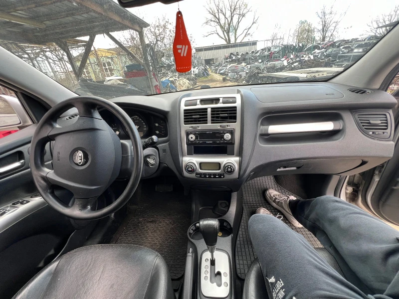 Kia Sportage 2.0 CRDi Aвтомат/ръчка, снимка 7 - Автомобили и джипове - 41599297