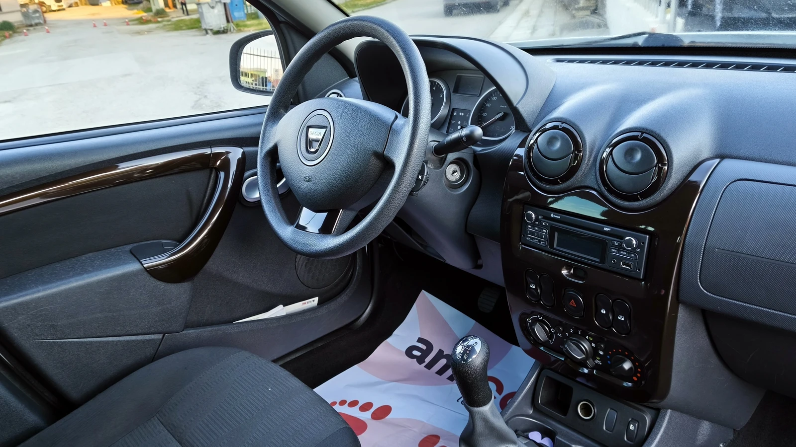 Dacia Duster 1.6i LPG , снимка 11 - Автомобили и джипове - 54443196