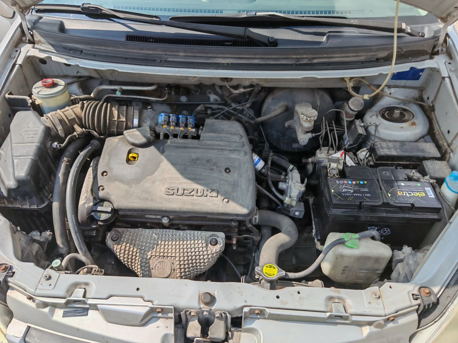 Suzuki Liana 1.6, снимка 12 - Автомобили и джипове - 54747631