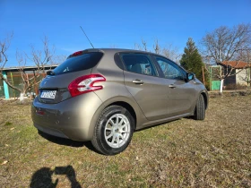 Peugeot 208 1.4 HDi/ Навигация / Парктроник/ Нови гуми, снимка 3