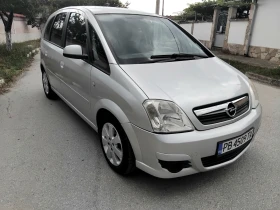 Opel Meriva 1.4i.80k + КЛИМА + ГАЗОВ ИНЖЕКЦИОН 2006г , снимка 9