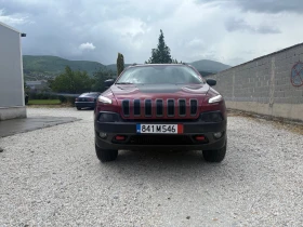 ������ Jeep Cherokee