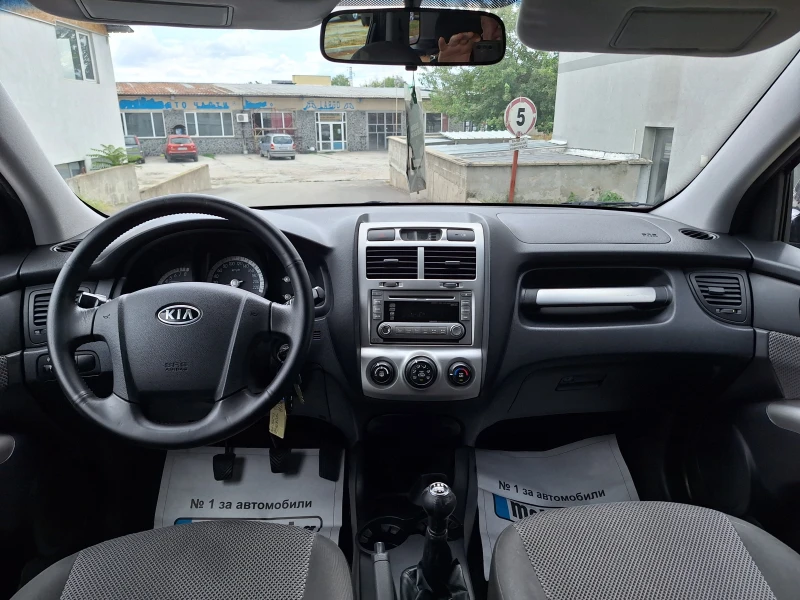 Kia Sportage 2.0i 141kc, снимка 10 - Автомобили и джипове - 47196565