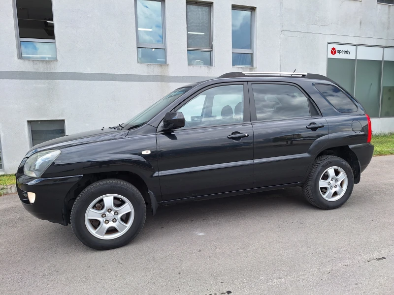 Kia Sportage 2.0i 141kc, снимка 7 - Автомобили и джипове - 47196565