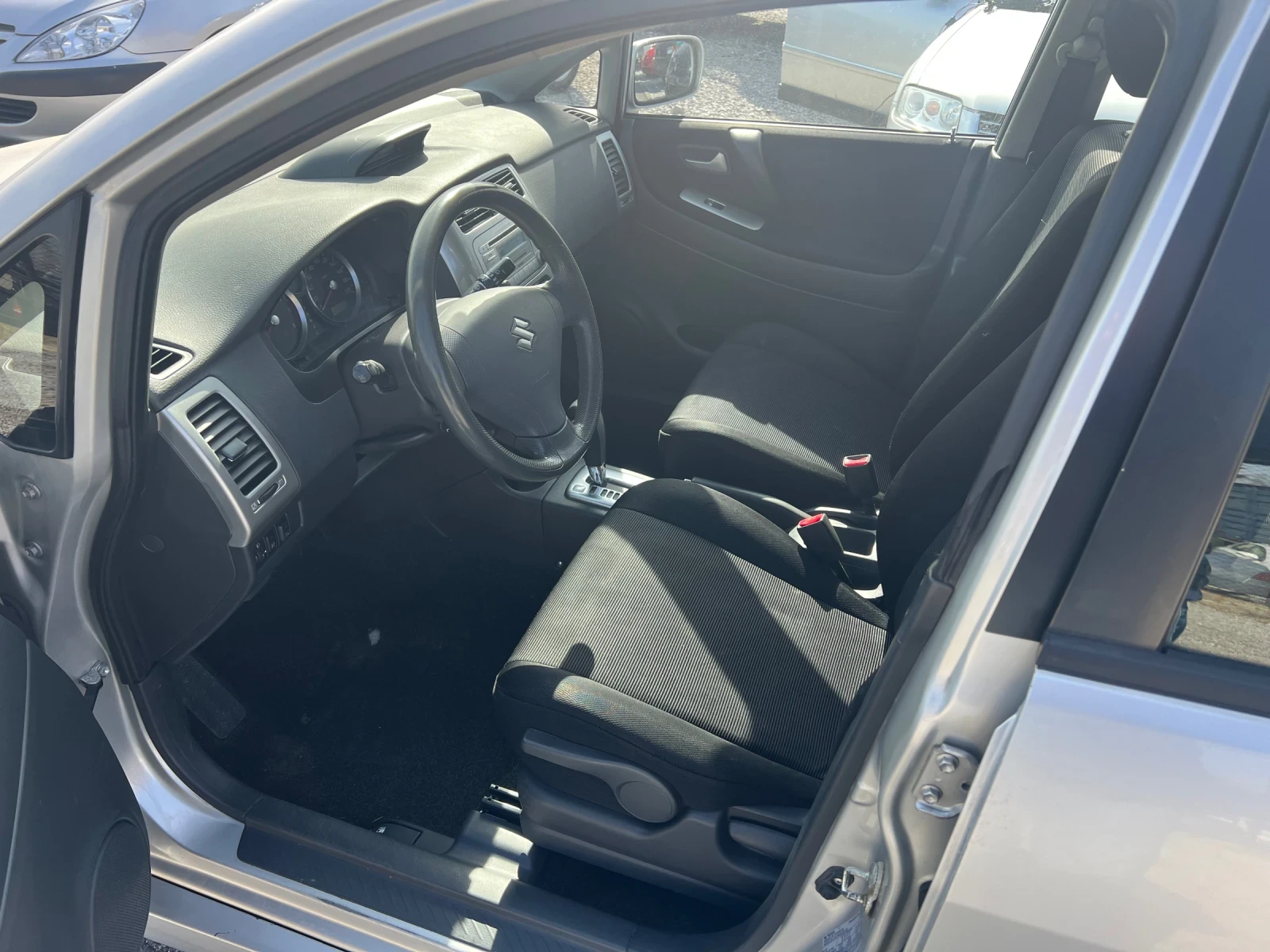 Suzuki Liana Sport 1.6i 4x4 AVTOMAT, снимка 7 - Автомобили и джипове - 53746847