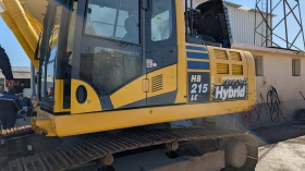 Багер Komatsu HB215-LC, снимка 1