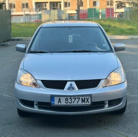Mitsubishi Lancer 1.6 90 к.с 2008г - 1899 € / 3714.12 лв. - 74812195 6