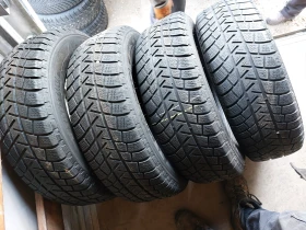 Гуми Зимни 205/70R15, снимка 1 - Гуми и джанти - 48830210