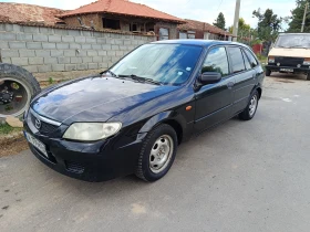 Mazda 323, снимка 1