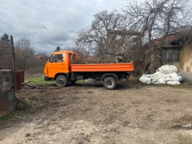 транспорт със самосвал
