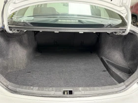 Toyota Corolla SDN 1.6 VVT-i 6MT Luna * 32 000km* от България, снимка 17