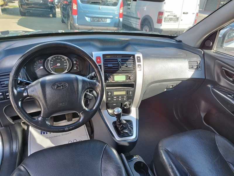 Hyundai Tucson 2.0crdi, снимка 11 - Автомобили и джипове - 47622712