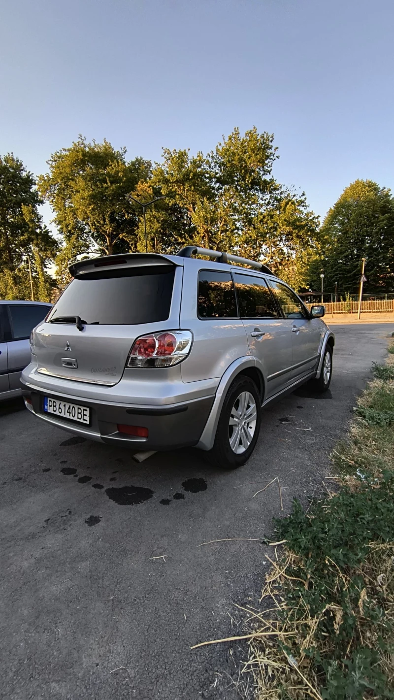 Mitsubishi Outlander 2.4 i 16v 4WD LPG, снимка 4 - Автомобили и джипове - 47335650