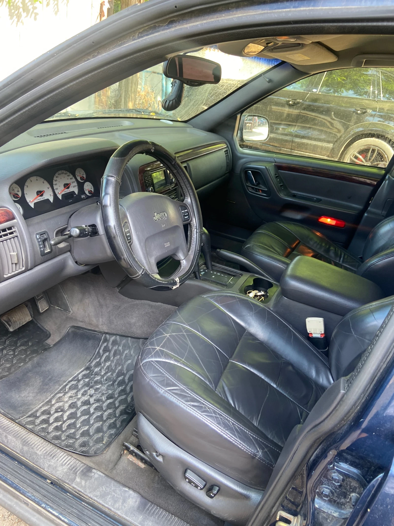 Jeep Grand cherokee 4.7 Quadra Drive, снимка 6 - Автомобили и джипове - 55206891