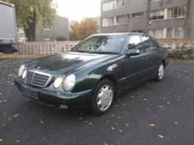      ,     Mercedes-Benz E 220