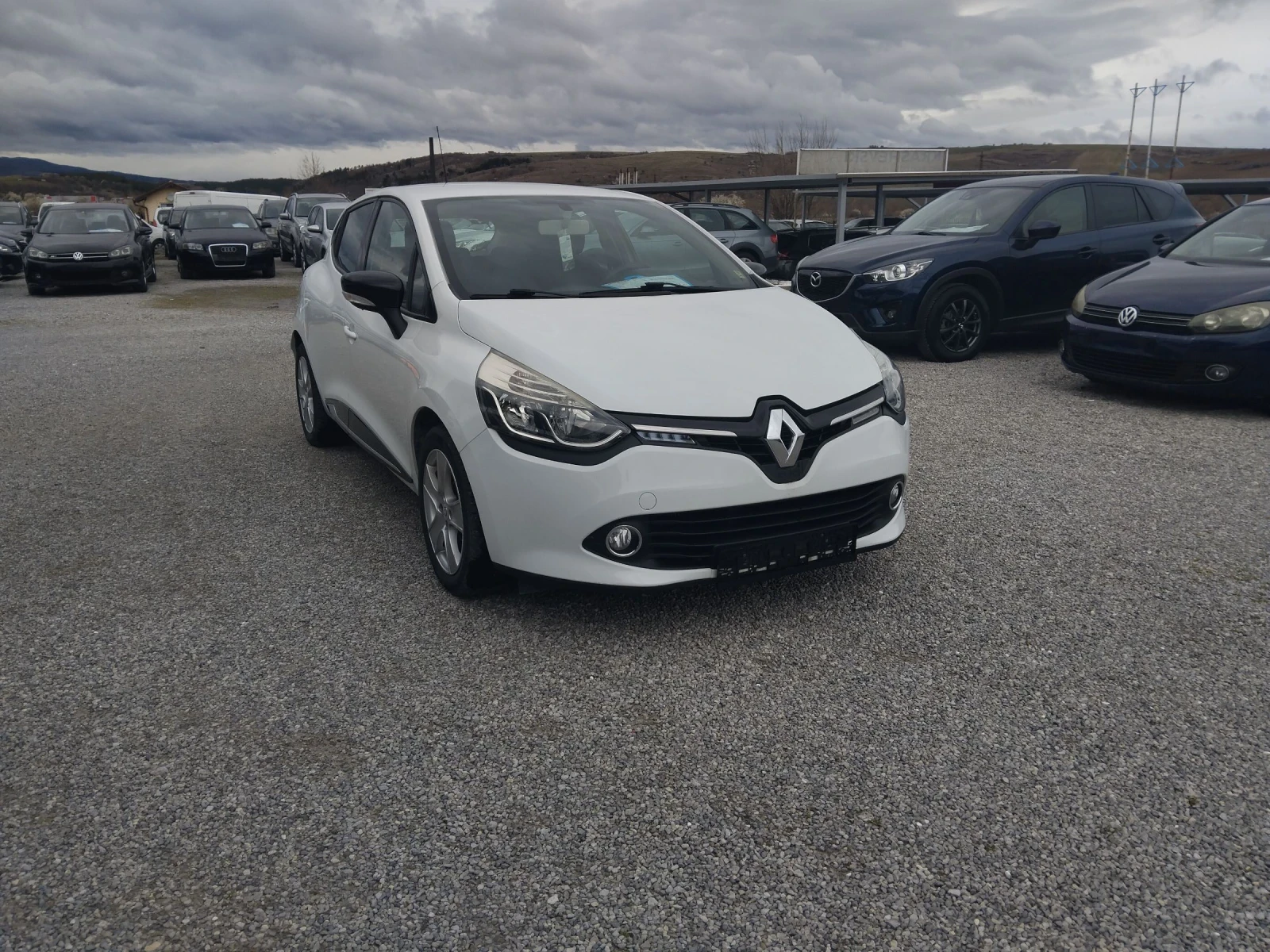 Renault Clio 1.5DCi75ксНАВИ, снимка 8 - Автомобили и джипове - 54088797