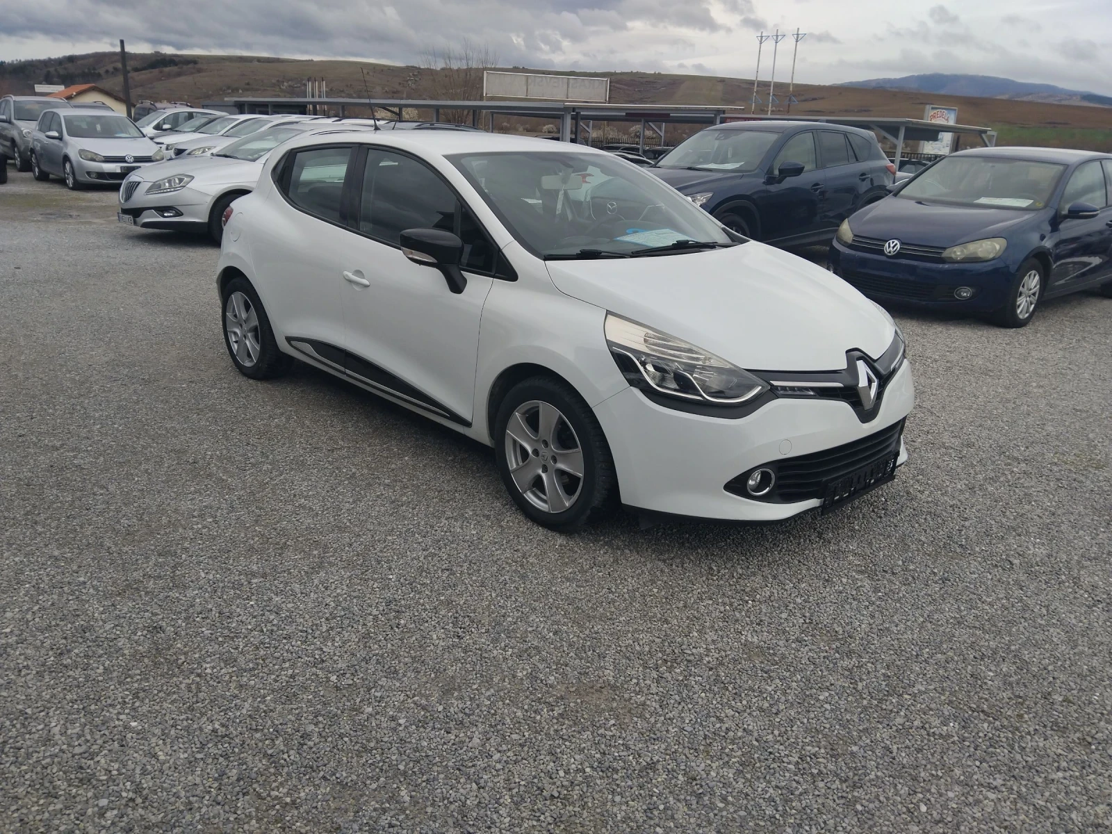 Renault Clio 1.5DCi75ксНАВИ, снимка 14 - Автомобили и джипове - 54088797