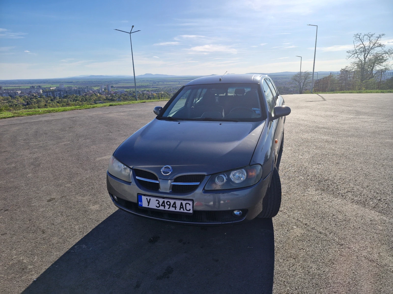 Nissan Almera 1.8i N16 116 - изображение 2