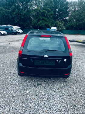 Ford Fiesta 1.4iGhia, Климатик, Нов внос от Германия - 2800 лв. - 37721674 6