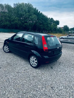 Ford Fiesta 1.4iGhia, Климатик, Нов внос от Германия - 2800 лв. - 37721674 2