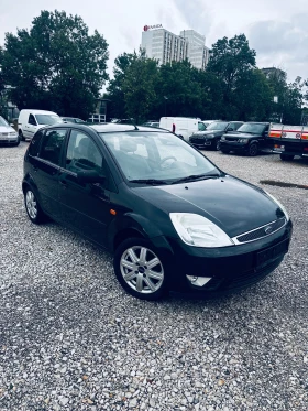 Ford Fiesta 1.4iGhia, Климатик, Нов внос от Германия - 2800 лв. - 37721674 3