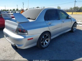 Mitsubishi Lancer EVOLUTION MR* MANUAL* BUCKET SEATS*  - 22450 € - 55864478 4