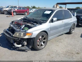 Mitsubishi Lancer EVOLUTION MR* MANUAL* BUCKET SEATS*  - 22450 € - 55864478 2