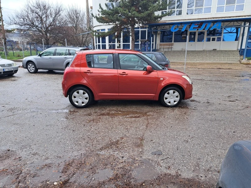 Suzuki Swift 1.3 I 4X4, снимка 6 - Автомобили и джипове - 44774535