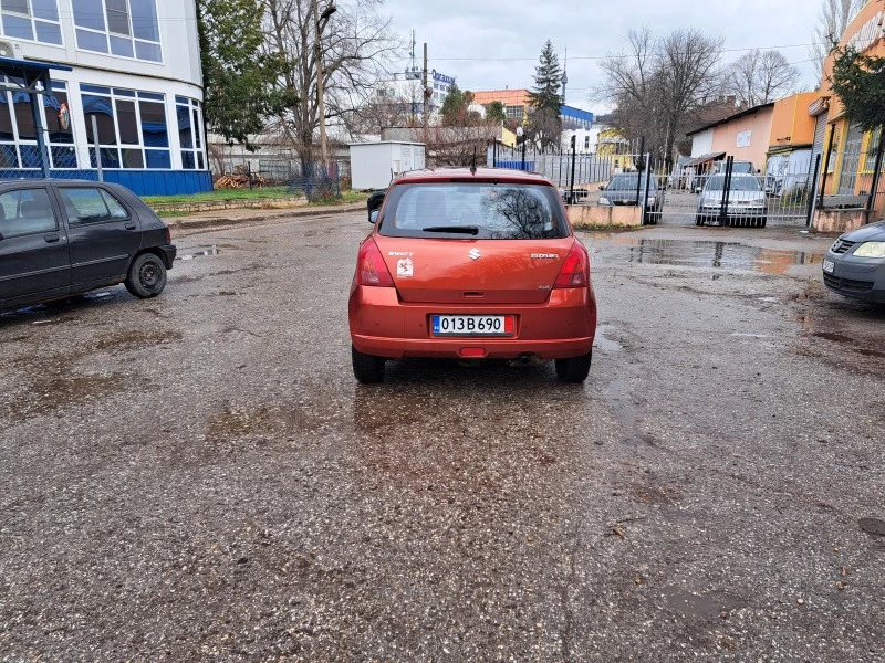 Suzuki Swift 1.3 I 4X4, снимка 4 - Автомобили и джипове - 44774535