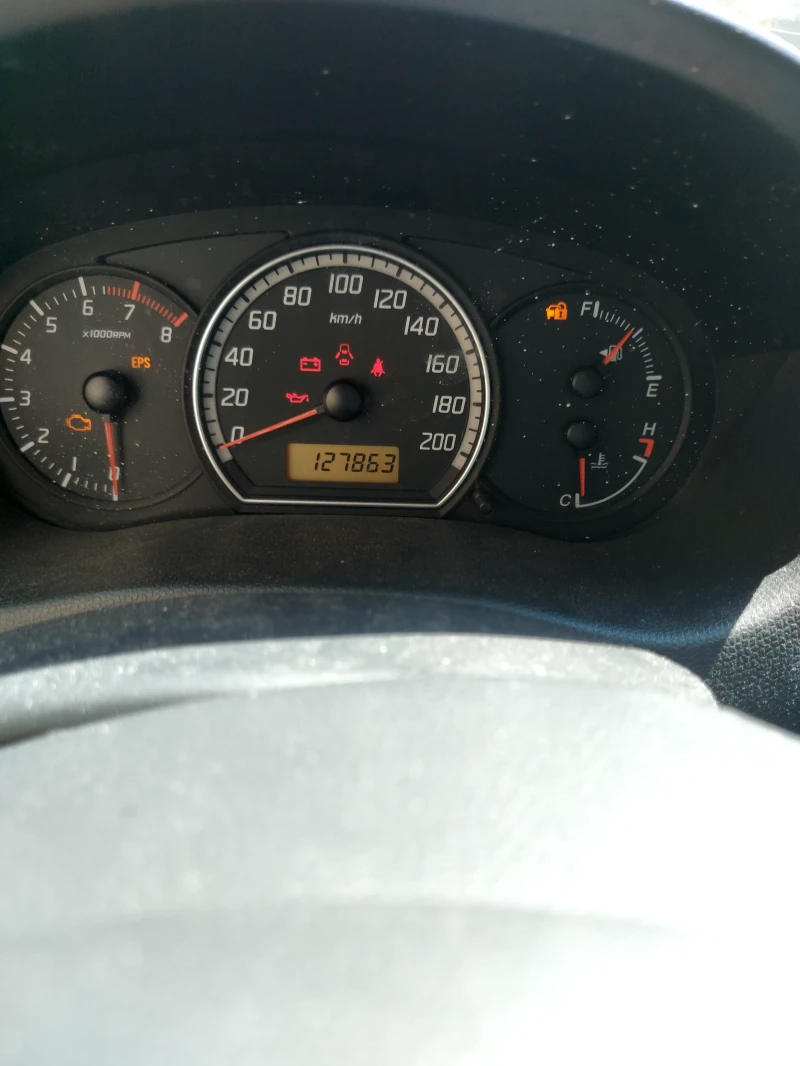 Suzuki Swift 1.3 БЕНЗИН 92кс. 4х4 , снимка 4 - Автомобили и джипове - 53600502