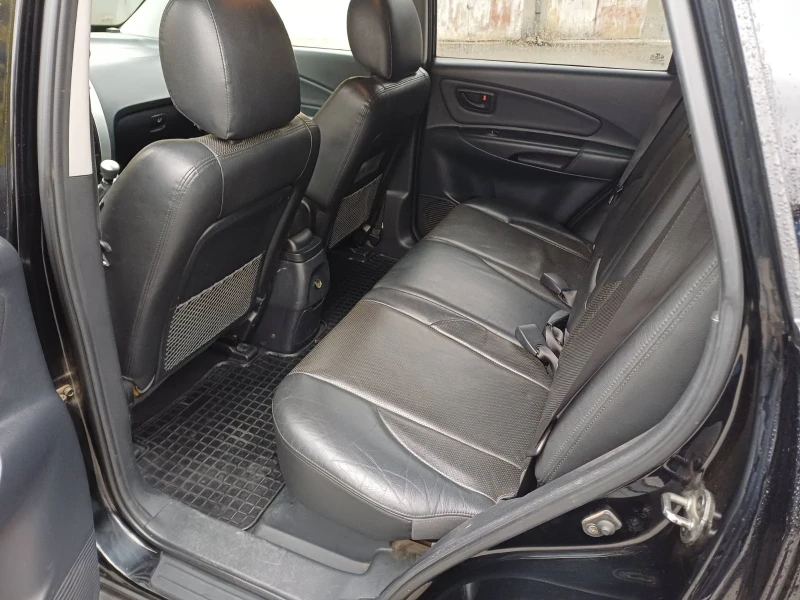 Hyundai Tucson 2.0 GRDI 140кс, снимка 6 - Автомобили и джипове - 52635711