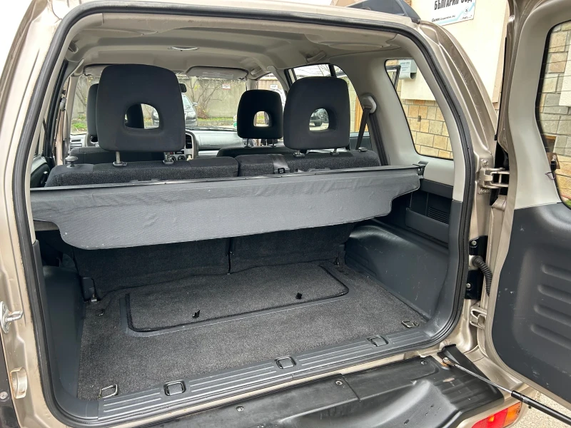 Suzuki Vitara 2.0i 4x4 КЛИМАТИК , снимка 11 - Автомобили и джипове - 52877063