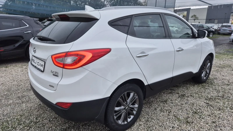 Hyundai IX35 2.0CRDI 4X4 НАВИ КАМЕРА КЕЙЛЕС ВИДЕО ЛИЗИНГ , снимка 6 - Автомобили и джипове - 52344025