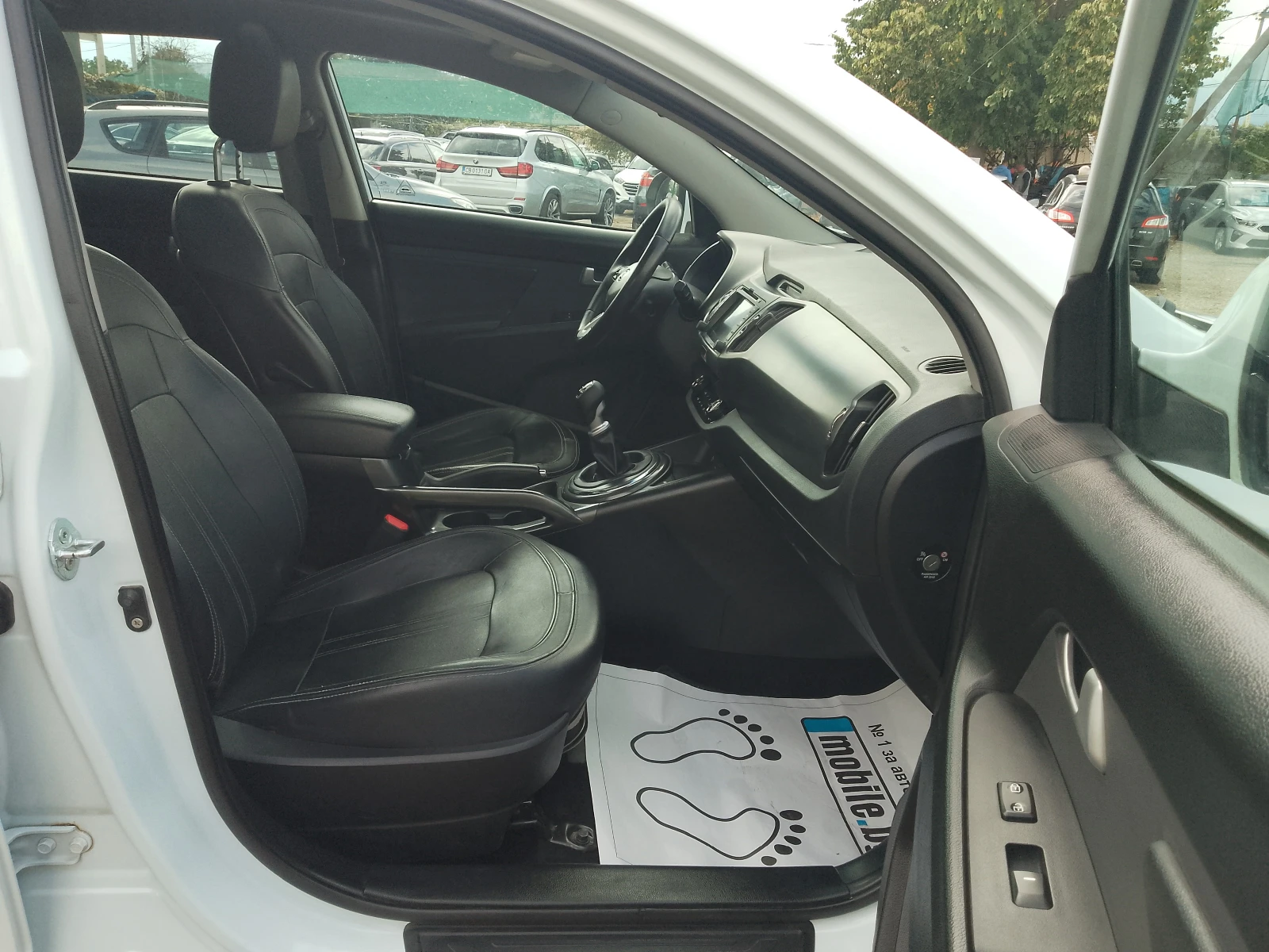 Kia Sportage 2.0 CRDI AWD PREMIUM, снимка 8 - Автомобили и джипове - 56232436