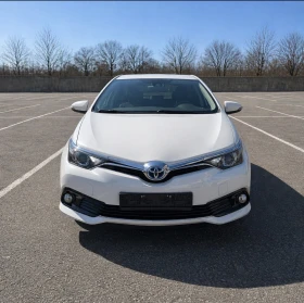 Toyota Auris Hybrid 1.8i Facelift/Navi - 12399 € / 24250.34 лв. - 32423059 2