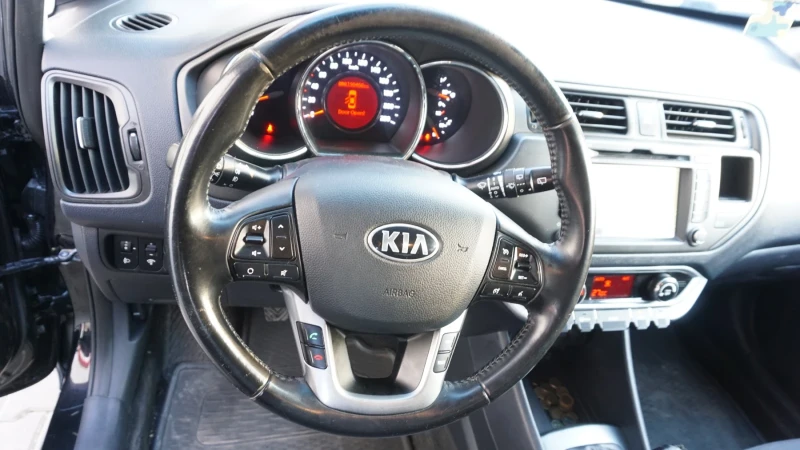 Kia Rio 1.1 EURO 5, снимка 7 - Автомобили и джипове - 48995212